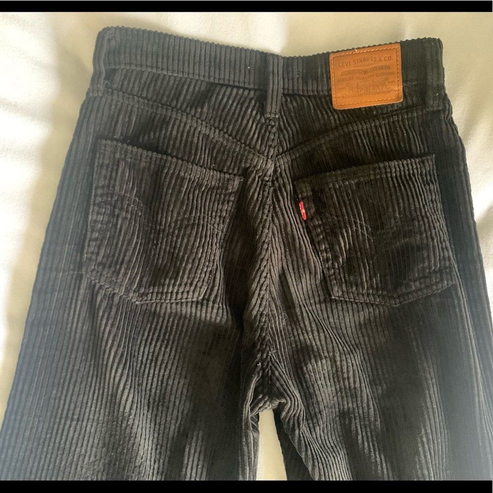 Levi’s black corduroy wide leg, high rise pants.